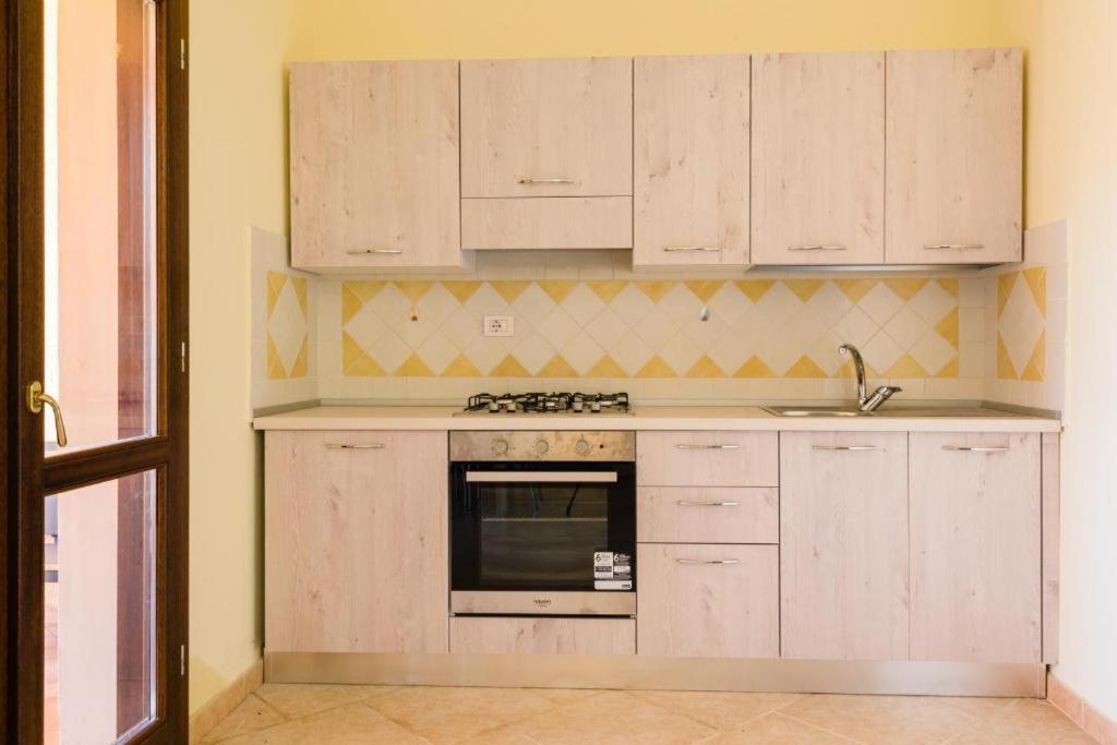 Le Perle Di Golfo Aranci Villa Luaran gambar